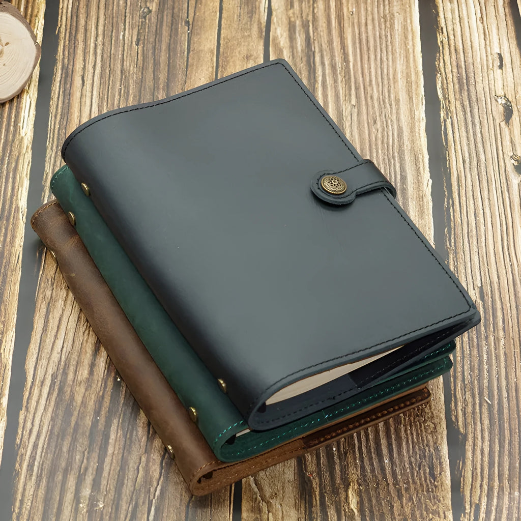 A5 genuine leather binder notebook with 100 sheets of 100gsm kraft paper, 210x140mm, in Crazy Horse Brown, Dark Green or Napa Black.