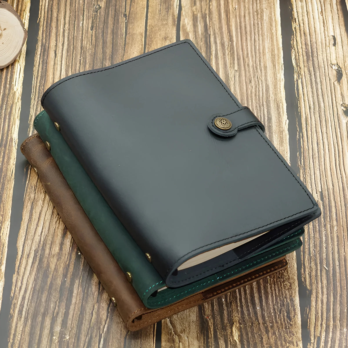 A5 genuine leather binder notebook with 100 sheets of 100gsm kraft paper, 210x140mm, in Crazy Horse Brown, Dark Green or Napa Black.