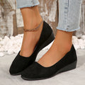 Women's pointed toe suede wedge pumps in light brown with a low rubber sole.