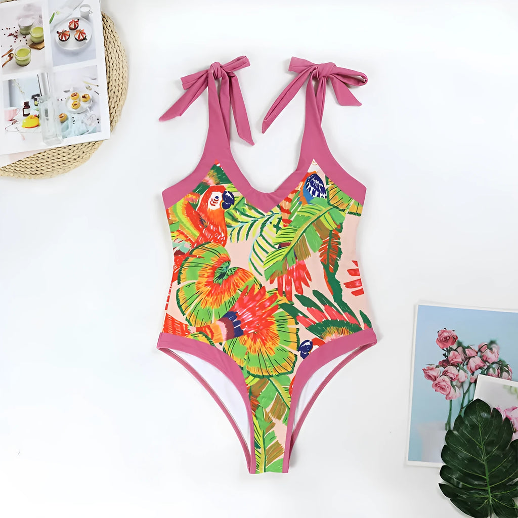 Retro floral print one-piece swimsuit with V-neck, covered belly, and attached thin skirt in pink