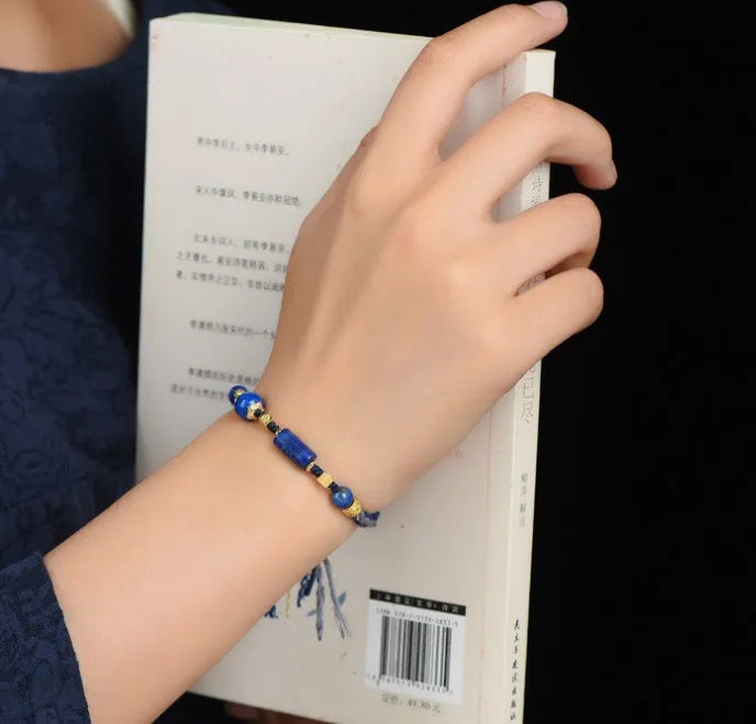 Hand-woven ethnic watch band in flexible wire with Hongfei Ebony and Lapis Lazuli colour options