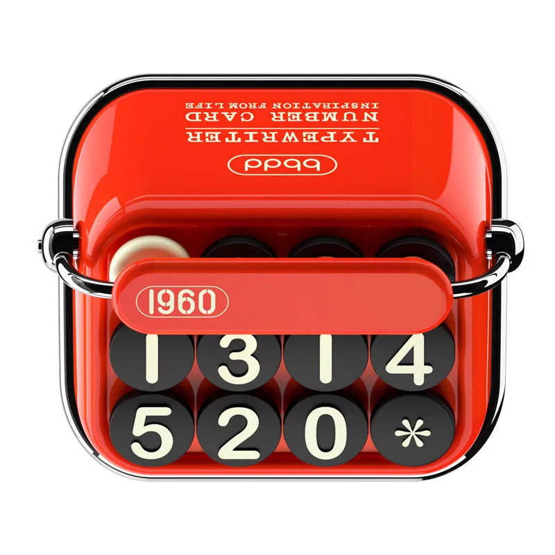 Creative typewriter-style temporary parking number plate in zinc alloy and ABS on a desk