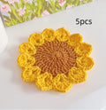 Hand-woven circular wool coaster with floral pattern, 10.5cm diameter
