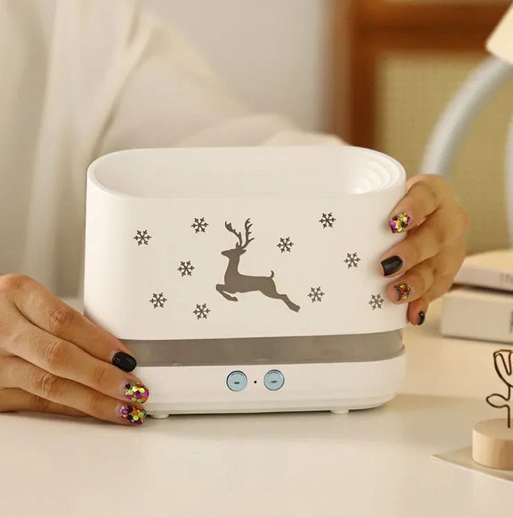White round elk flame humidifier diffuser with USB cable, showing flame effect from mist and light on a desk