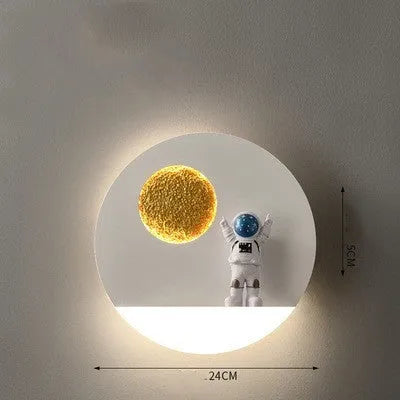 Astronaut-shaped wall lamp with shelf and LED lighting in black iron finish
