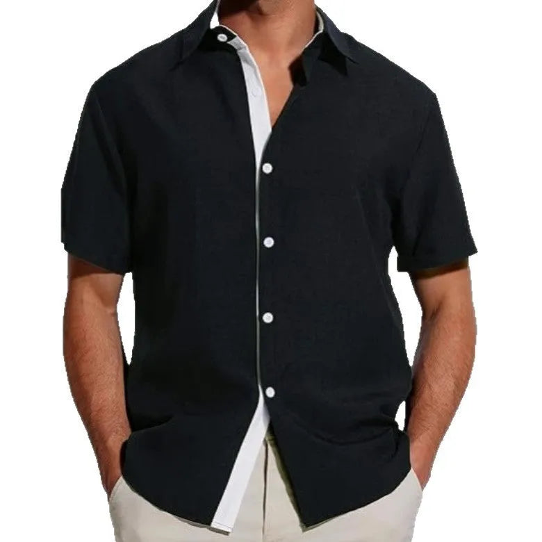 Men's short-sleeved floral print shirt in lightweight polyester fabric on a hanger.