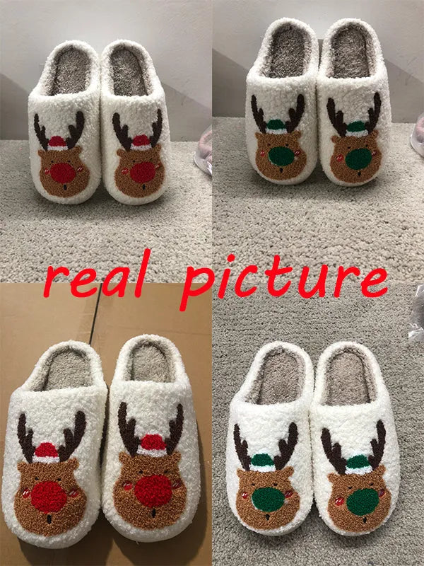 Christmas winter home slippers in red with plush upper and anti-slip sole on a wooden floor