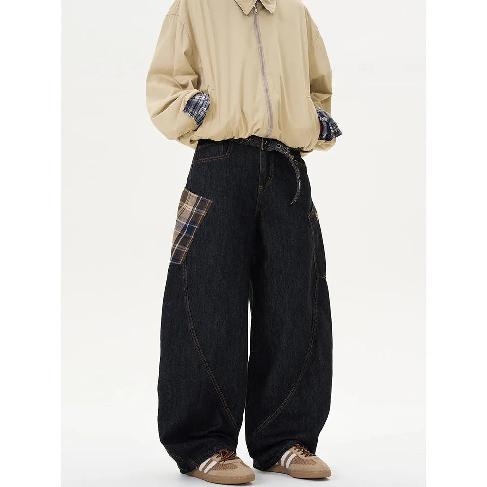 Loose straight-leg cotton trousers in a red plaid pattern, showing mid waist and casual fit.
