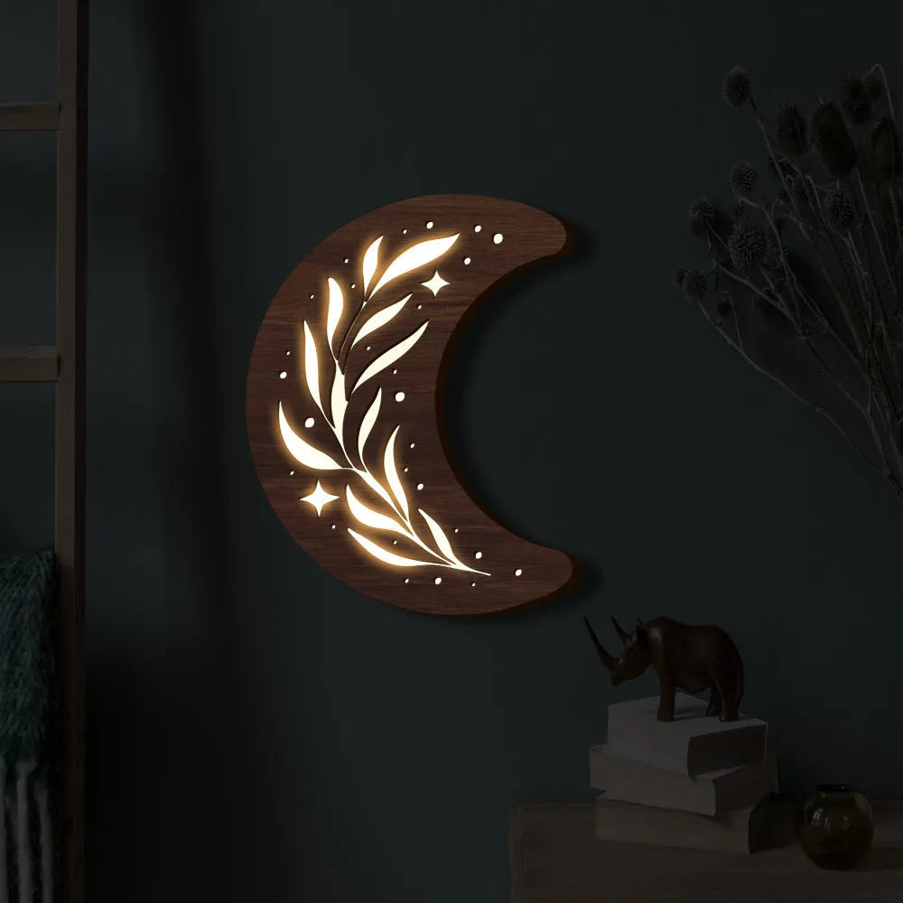 Bohemian style three-dimensional carved wooden leaf crescent pendant lamp with luminous night light.