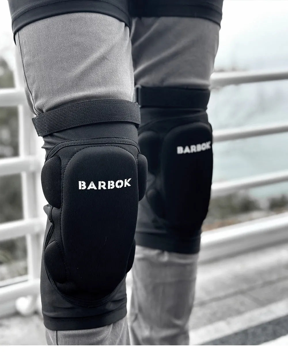Black adult roller skating hip protection shorts with integrated NBR foam armour panels.