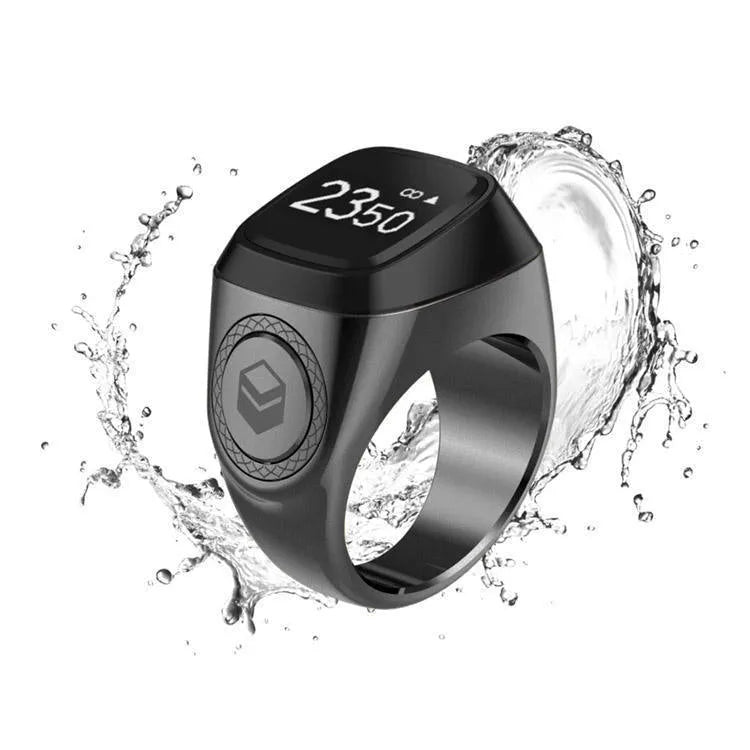 Zikr1 metal smart ring showing OLED display and button, in colours black, green, rose gold, and silver.