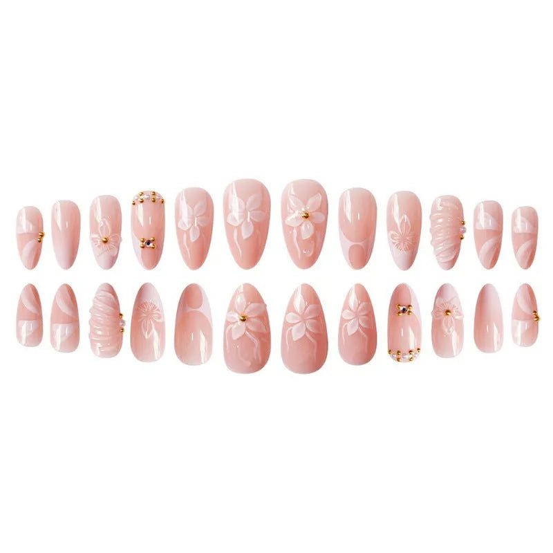 White almond fake nails with three-dimensional water ripple finish and flower pattern in colour AA214