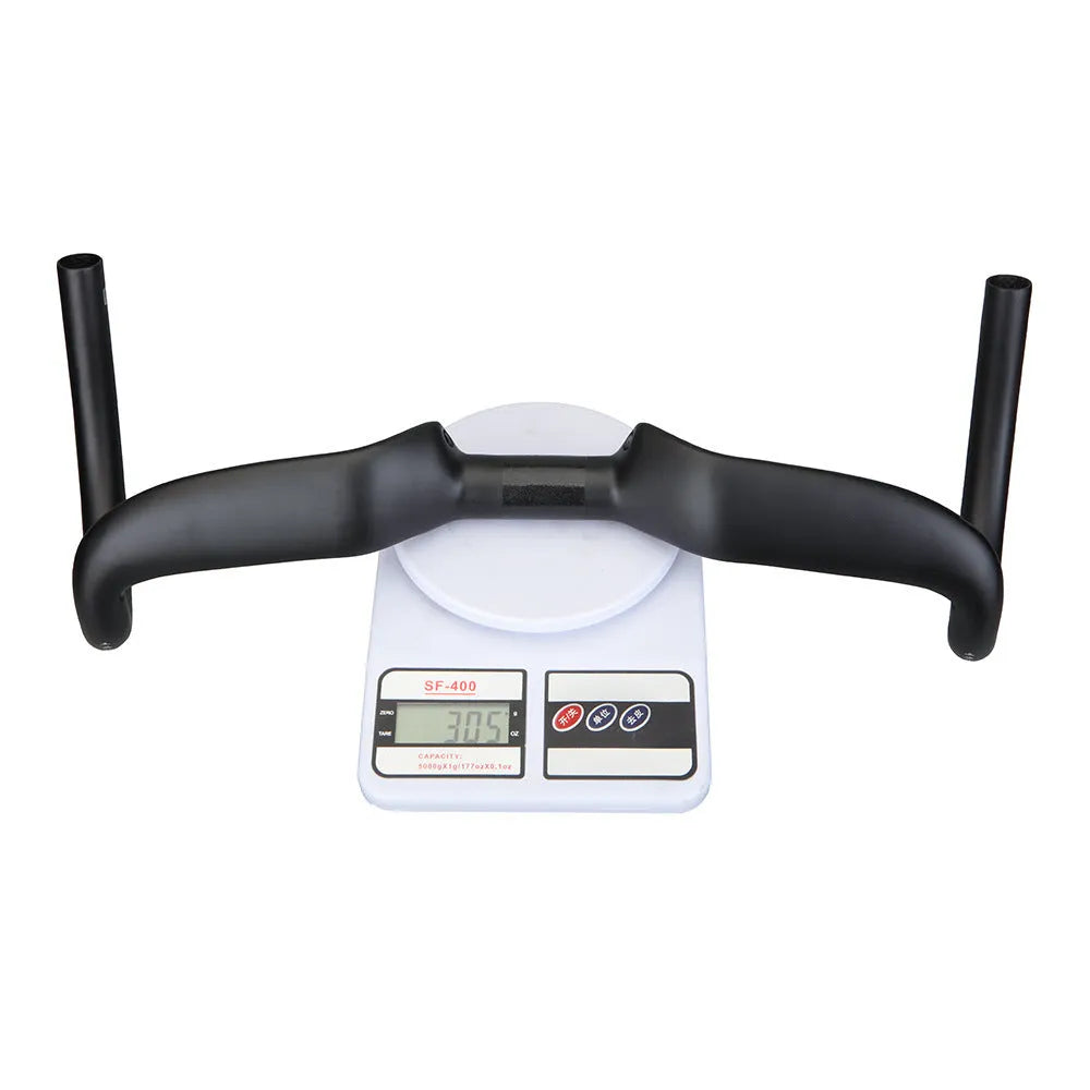 Black carbon fibre road bike handlebars showing large outer swing angle design