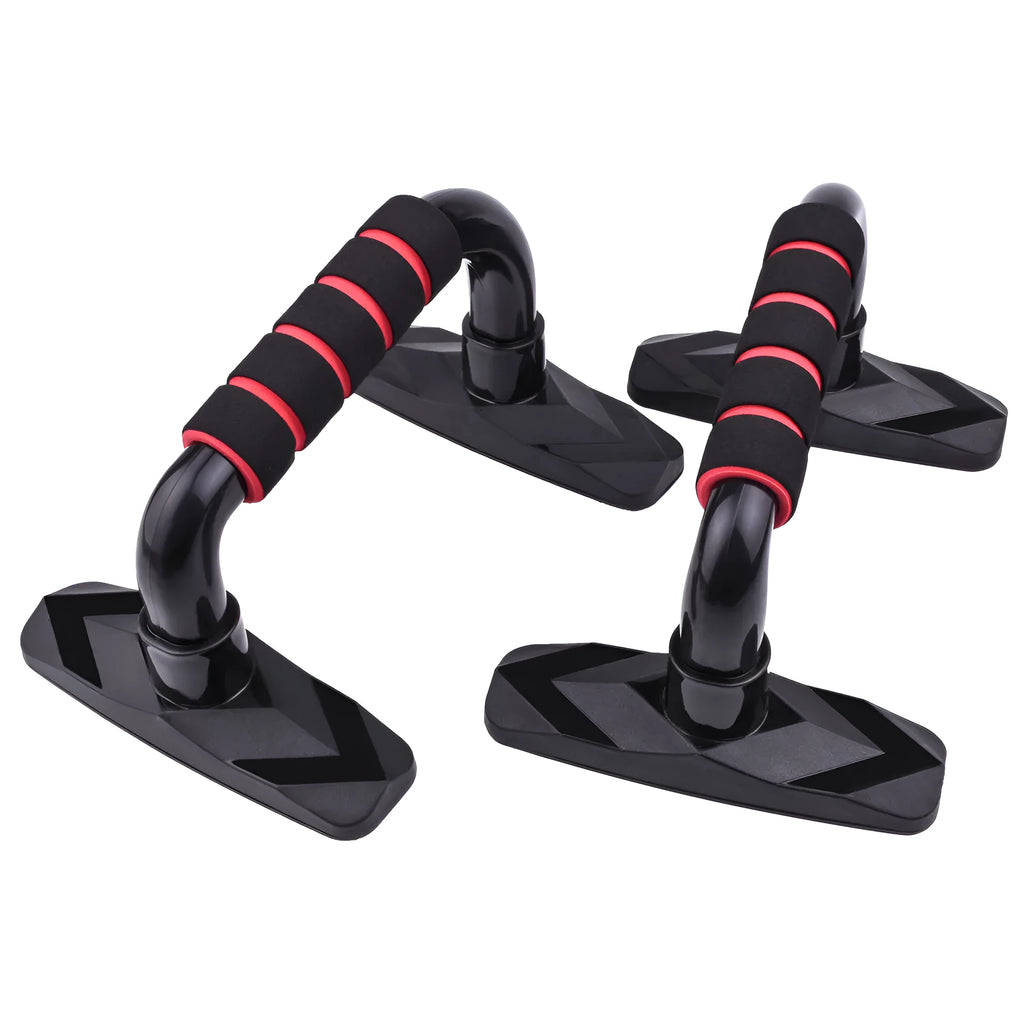Two black I-shaped push up bars with grey PP sponge handles on a floor.