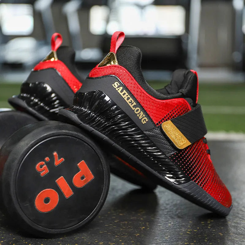 Pair of unisex weightlifting shoes with breathable Oxford cloth upper and non-slip rubber TPU sole, in red or dark blue.