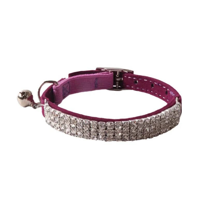 Flocked fabric cat collar with elastic buckle and gang drill pattern in multiple colours.