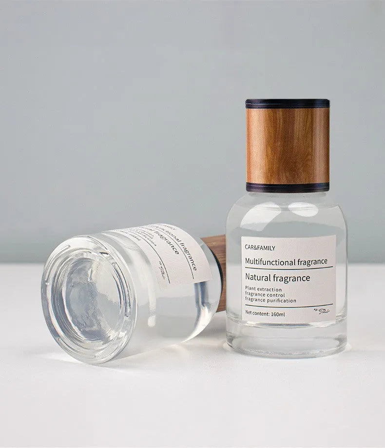 160ml glass car perfume bottle in round seat holder, 120x60mm, with five scent options.