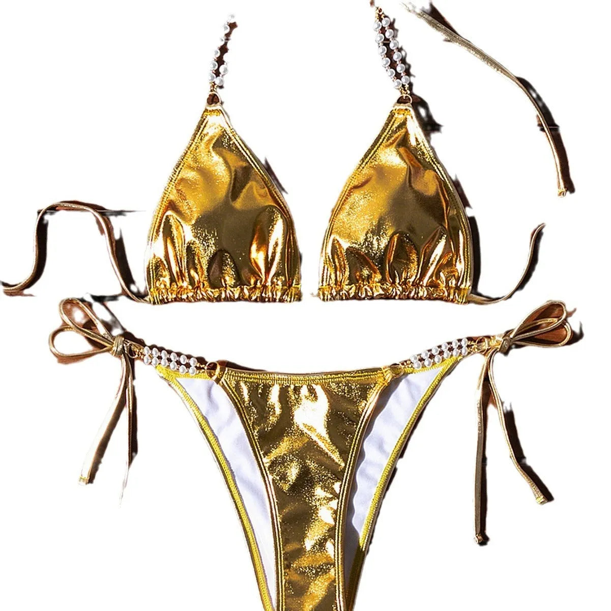 Gold halter lace-up bikini with pearl chain detail on mannequin showing front view