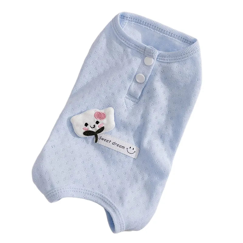 Pet shirt in soft yellow mesh fabric with cat patches and button closure on white background