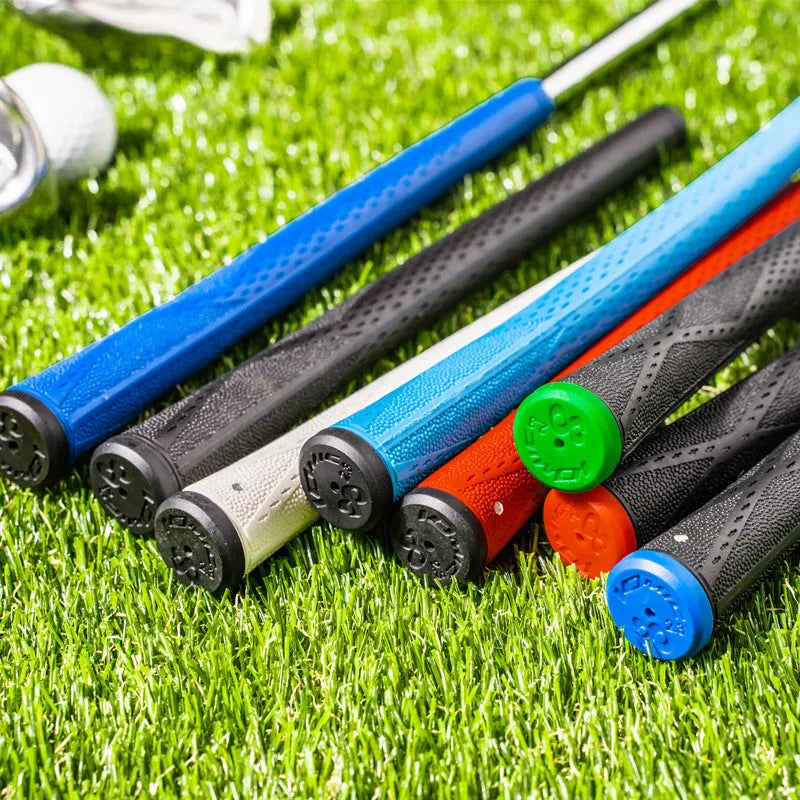 TPE golf club grip in assorted colours including pink, red, and black with blue head on a golf club.