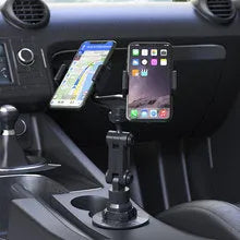 Peak-X5 coloured silicone automobile phone holder for car or desk.