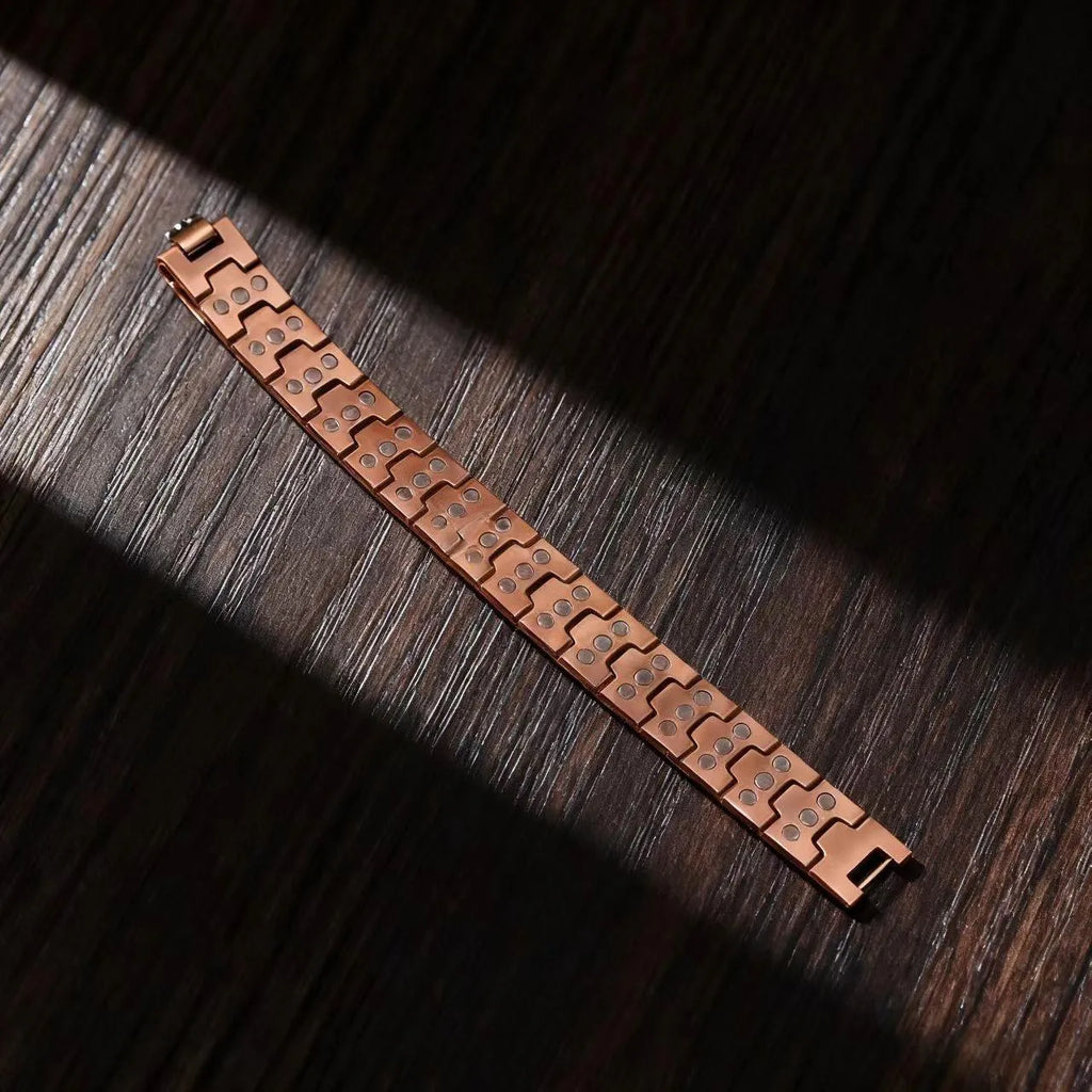 Retro bronze three-row magnetic bracelet with geometric links, zinc alloy electroplated finish and regulator