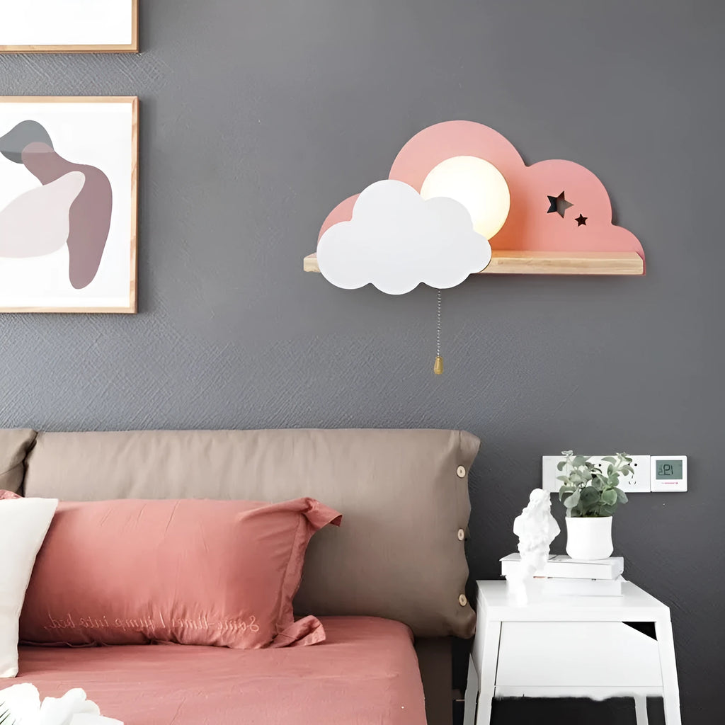 Cloud-shaped decorative glass wall lamp mounted on a wall, showing its silhouette and dimensions.
