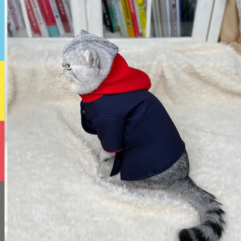 Polyester pet hoodie in tiger staff yuren pattern, sized small or medium, worn by a dog for photography.