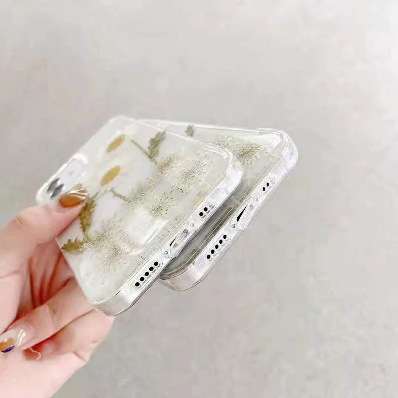 White epoxy daisy floral design TPU phone case for iPhone, showing back cover.