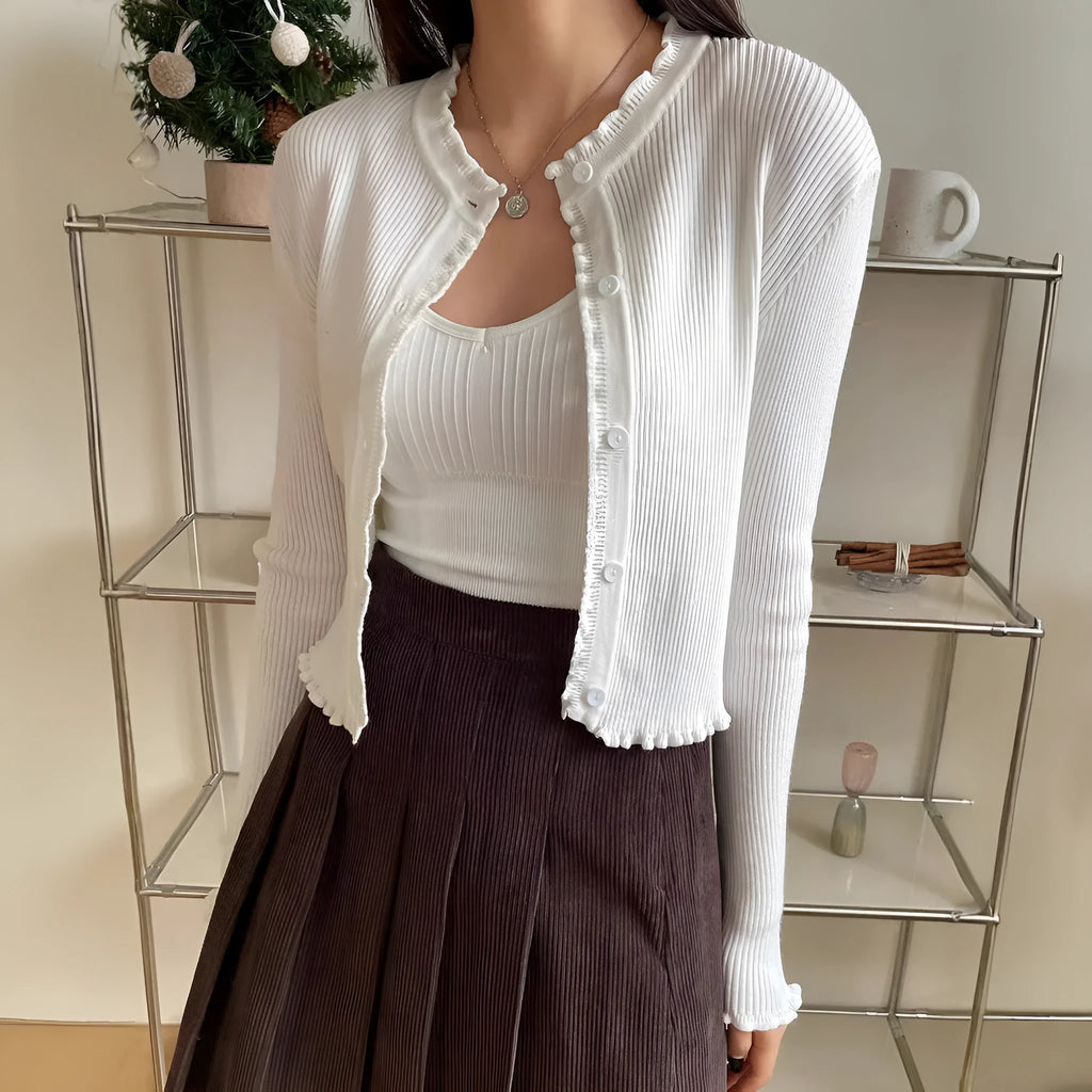 Women's white solid colour stringy selvedge cardigan with ruffled long sleeves, short length, open front design.