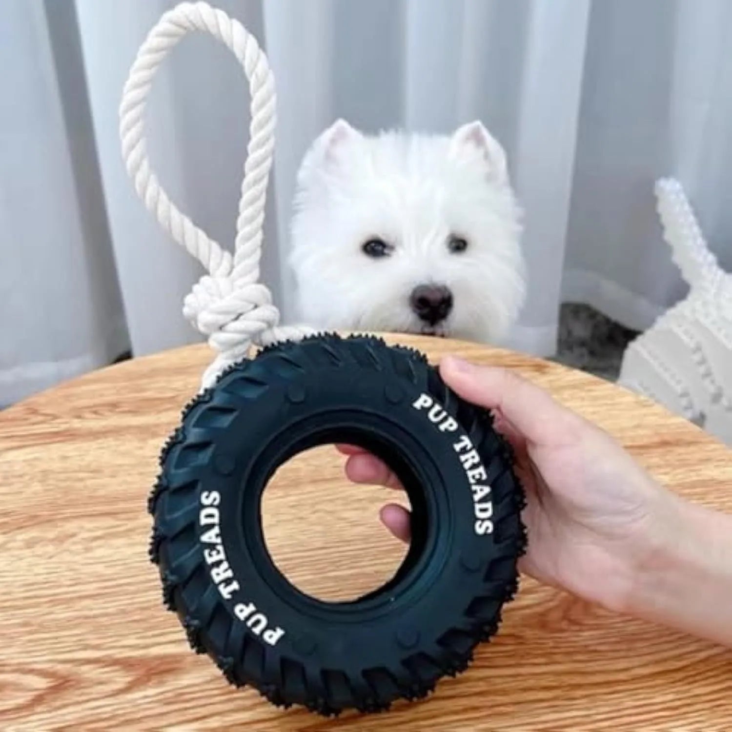 Black natural rubber tire dog toy with rope for aggressive chewers, large size 35x16 cm
