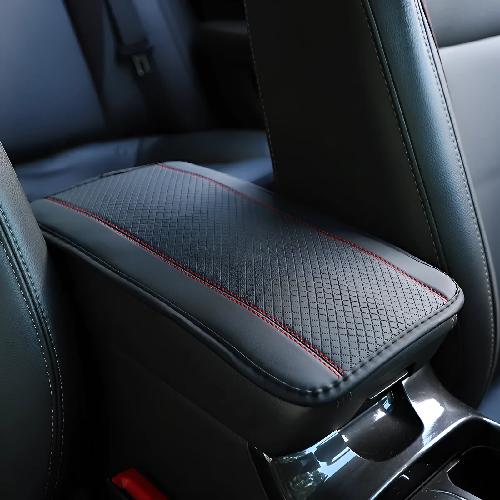 Black PU leather car armrest box cushion mat measuring 32 by 19 centimetres.