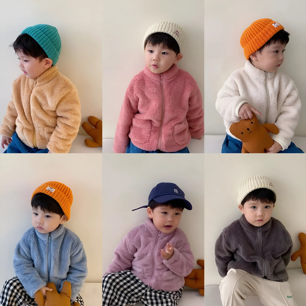 Blue children's sherpa fleece zip-up jacket with a high collar and front pockets.