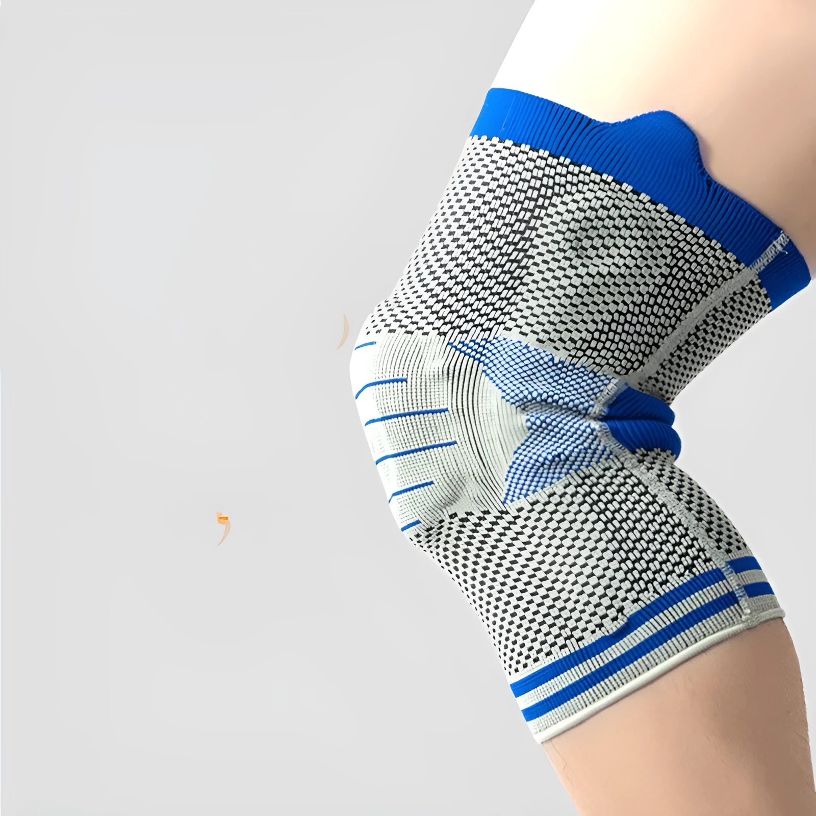 Cotton knee protector with silicone massage spring bar shock absorber in black and grey colour.