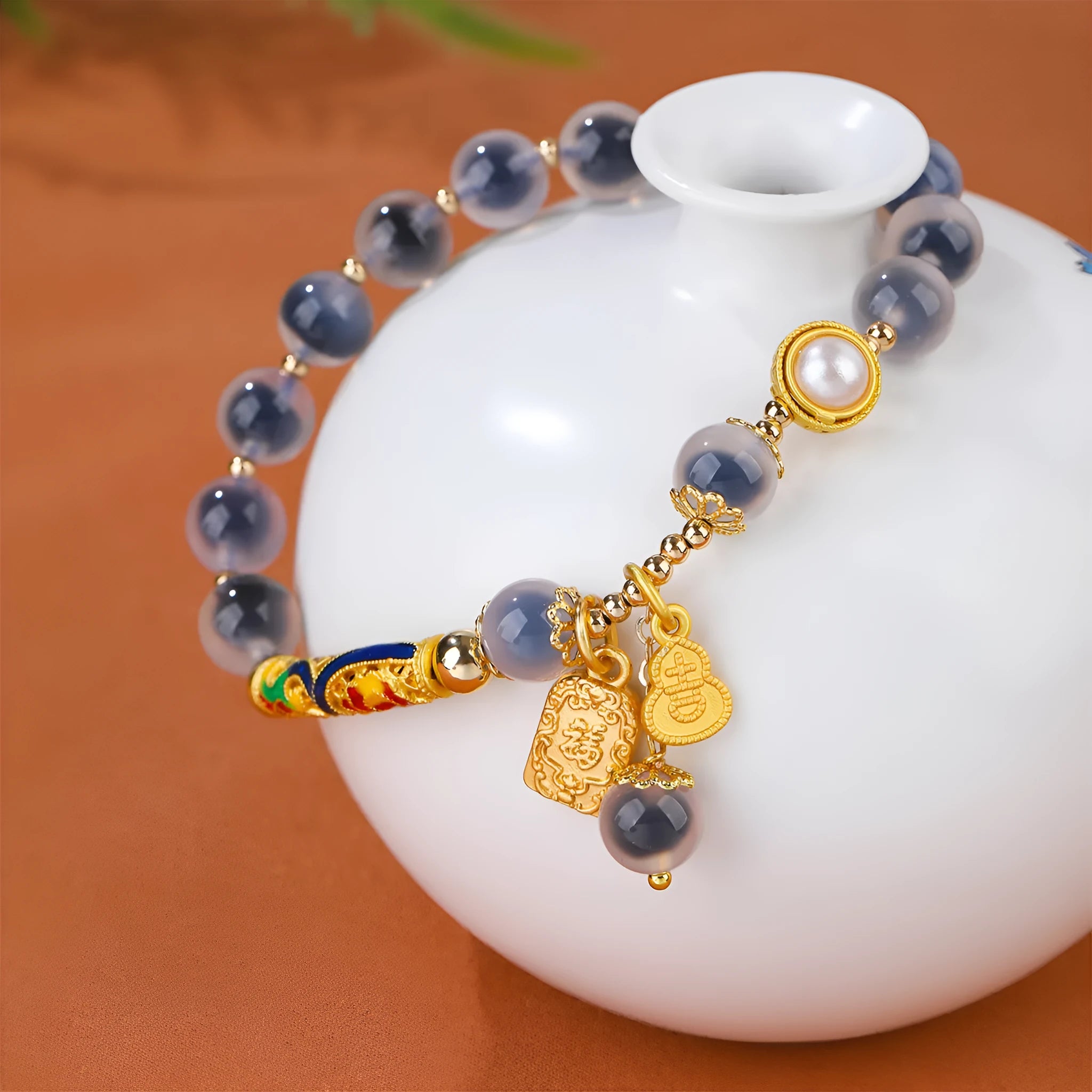 Sugar heart agate bracelet with retro minority design on woman's wrist showing handmade craftsmanship