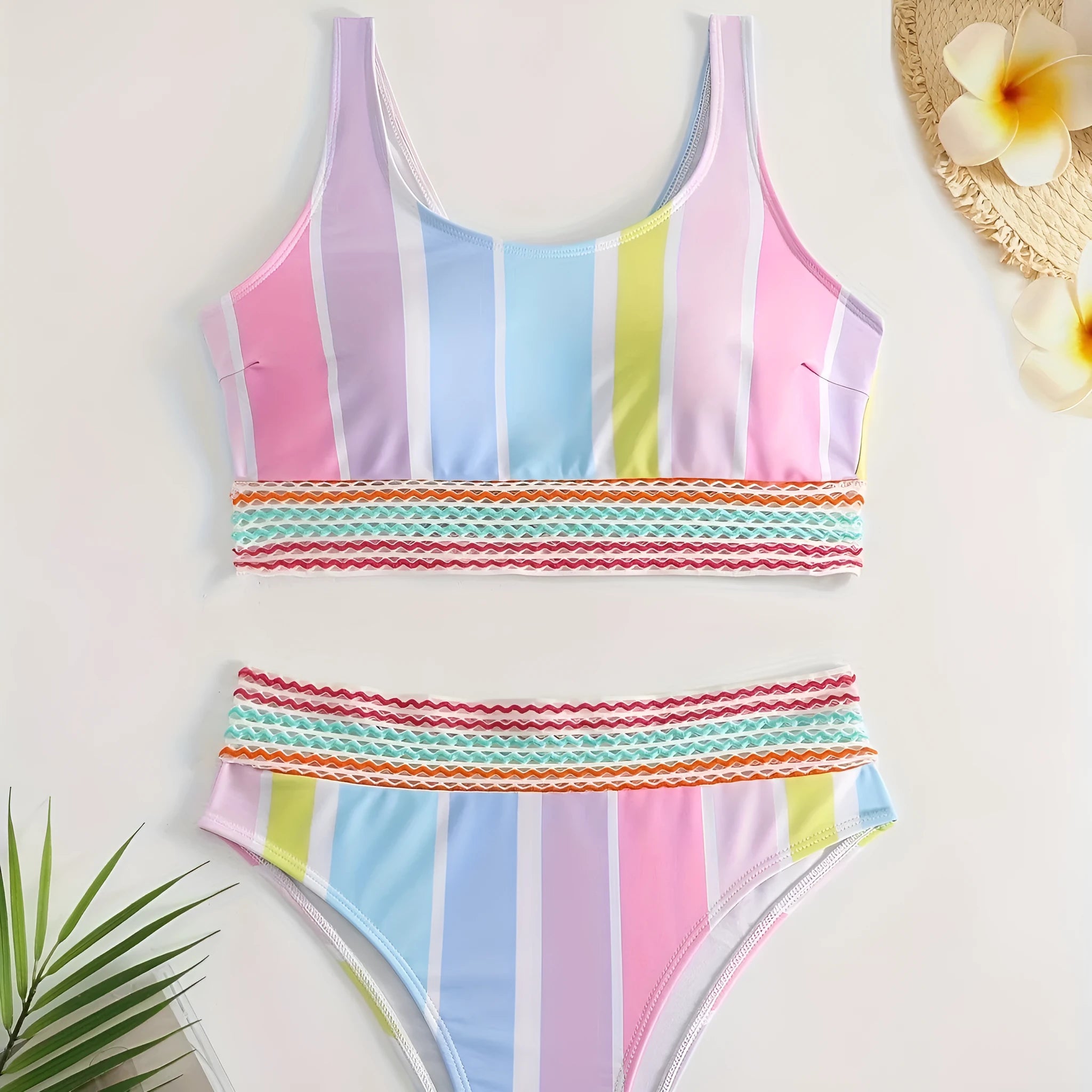 Women's striped bikini top and briefs set in a European and American style on a mannequin.