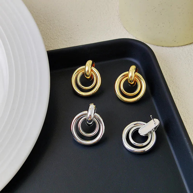 Geometric round ring earrings with irregular exotic design in gold or silver electroplated finish