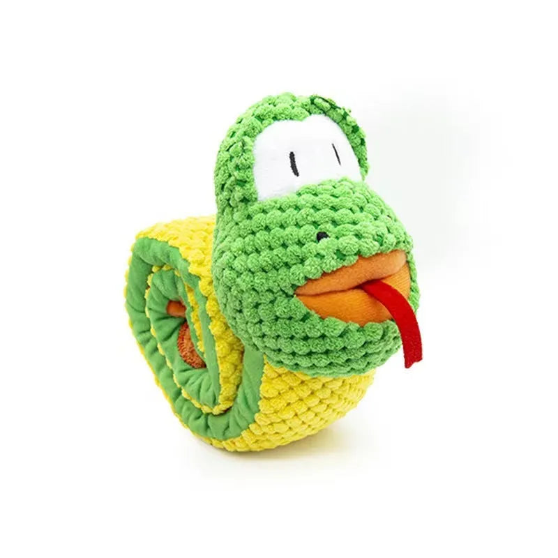 Green frog-shaped velvet dog squeak toy with hidden food holes for foraging puzzles.