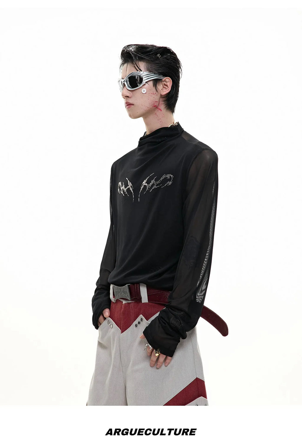 Black slim long sleeve mesh bottoming shirt on a hanger showing its fit and fabric texture.