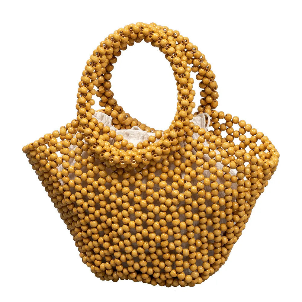 Hand-woven maple hollow handbag with wooden bead decoration, dumpling-shaped 13x7x18cm beach bag