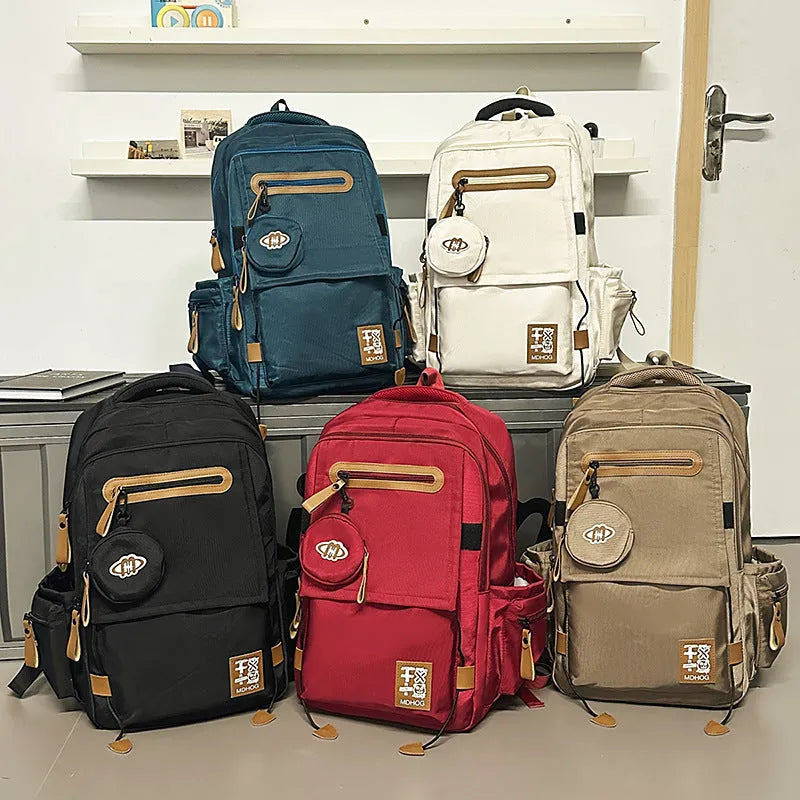 Large capacity waterproof leisure travel backpack in multiple colours with contrast stitching