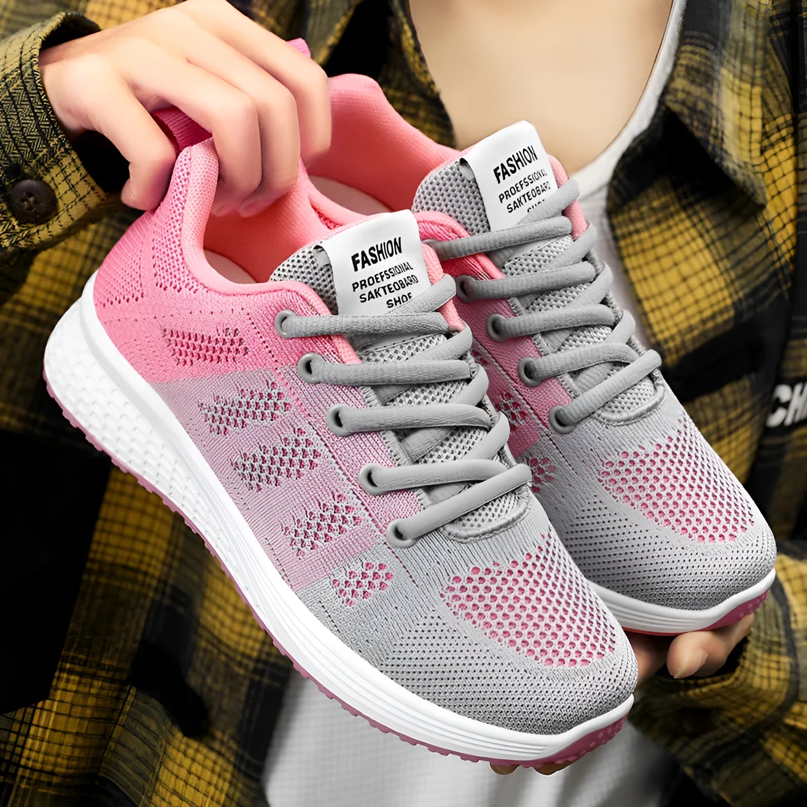 Women's running shoes with Flyknit upper and soft sole in black, rose red or grey pink colours