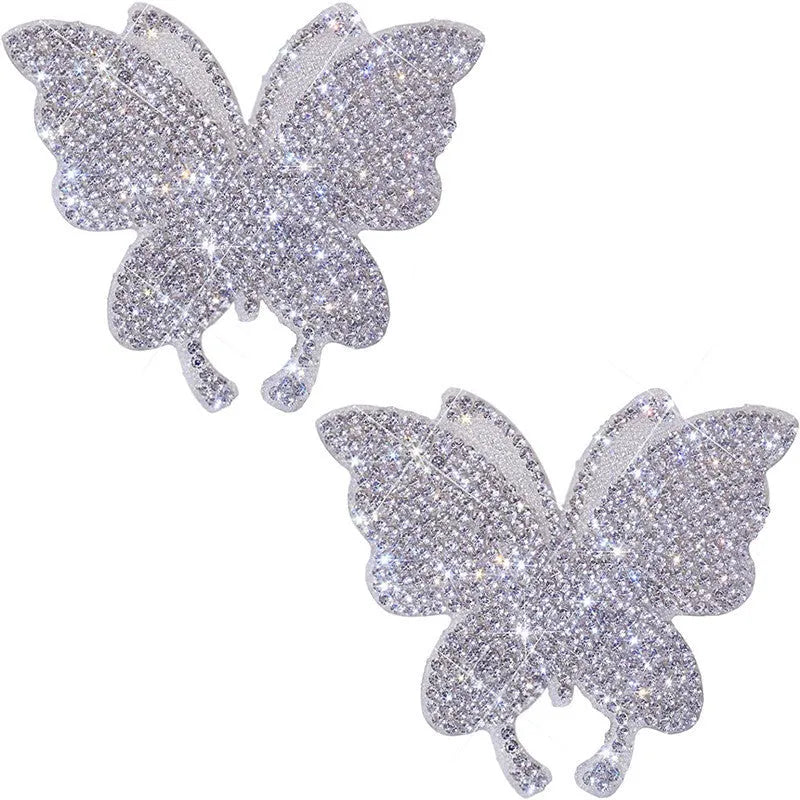 Diamond-encrusted glass car sticker in butterfly or bear paw design, 7x6cm.