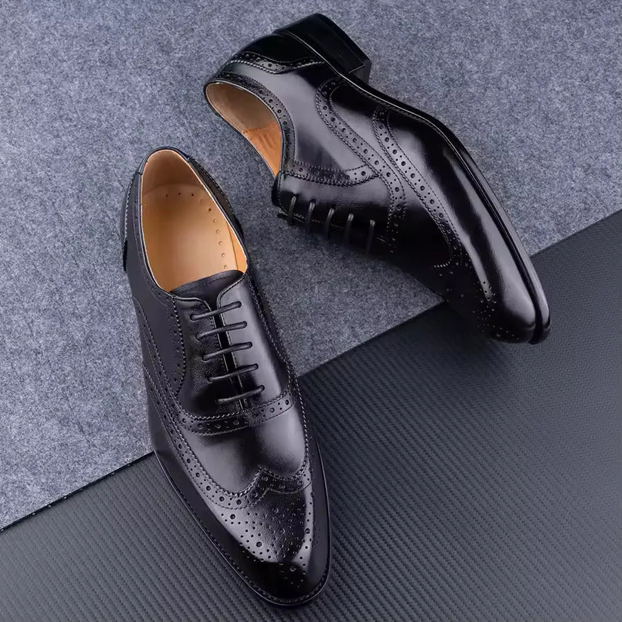Men's purple Oxford shoes with hand carved detailing and pointed toe style on rubber sole