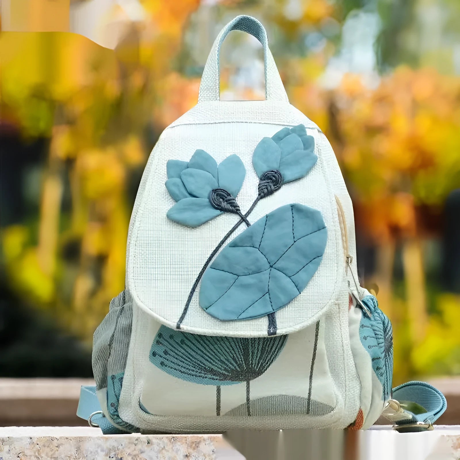 Ethnic style retro canvas backpack with floral print and outer pocket, soft construction for leisure travel