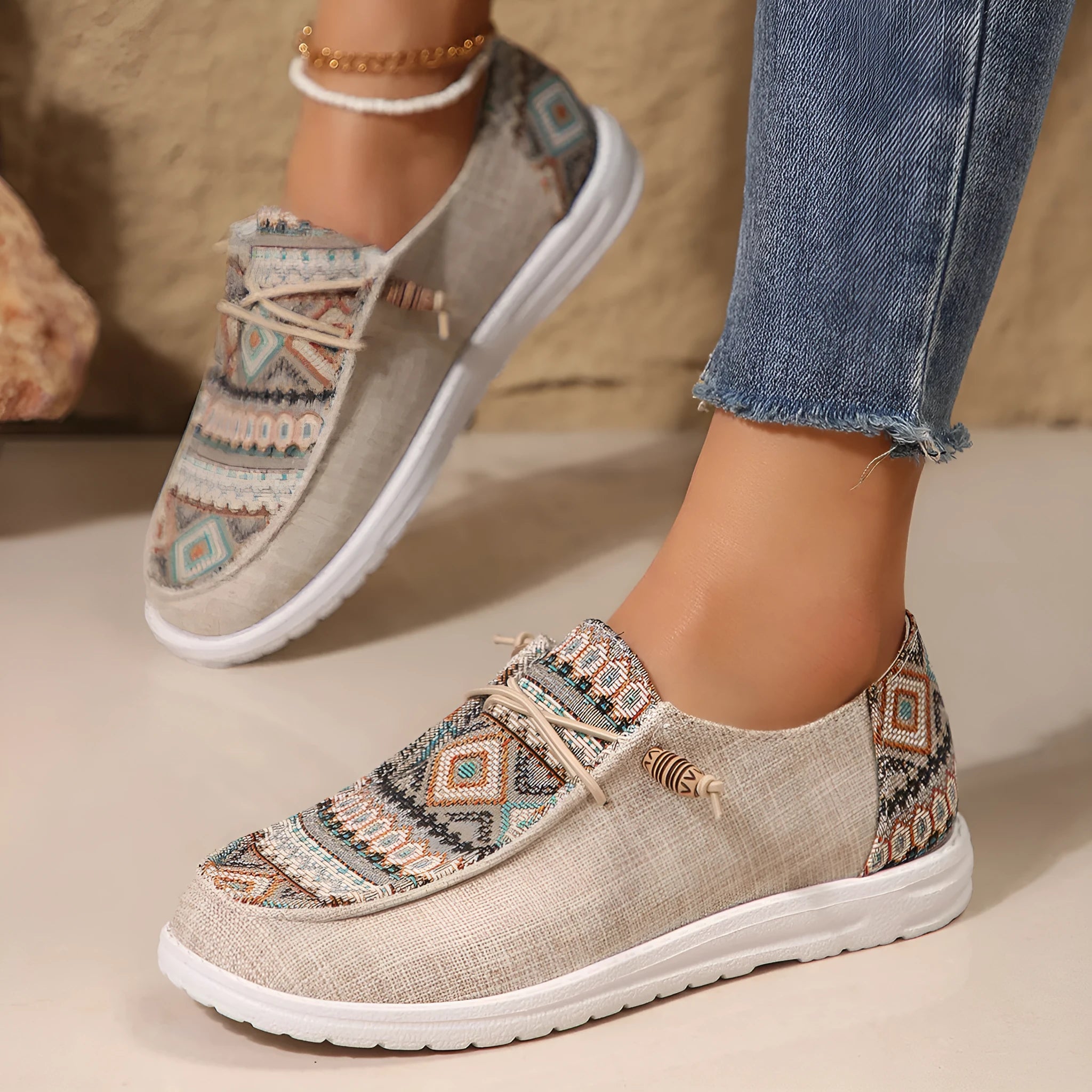 Women's flat round-toe low-top shoes in black, dark grey, or khaki with a rubber sole.