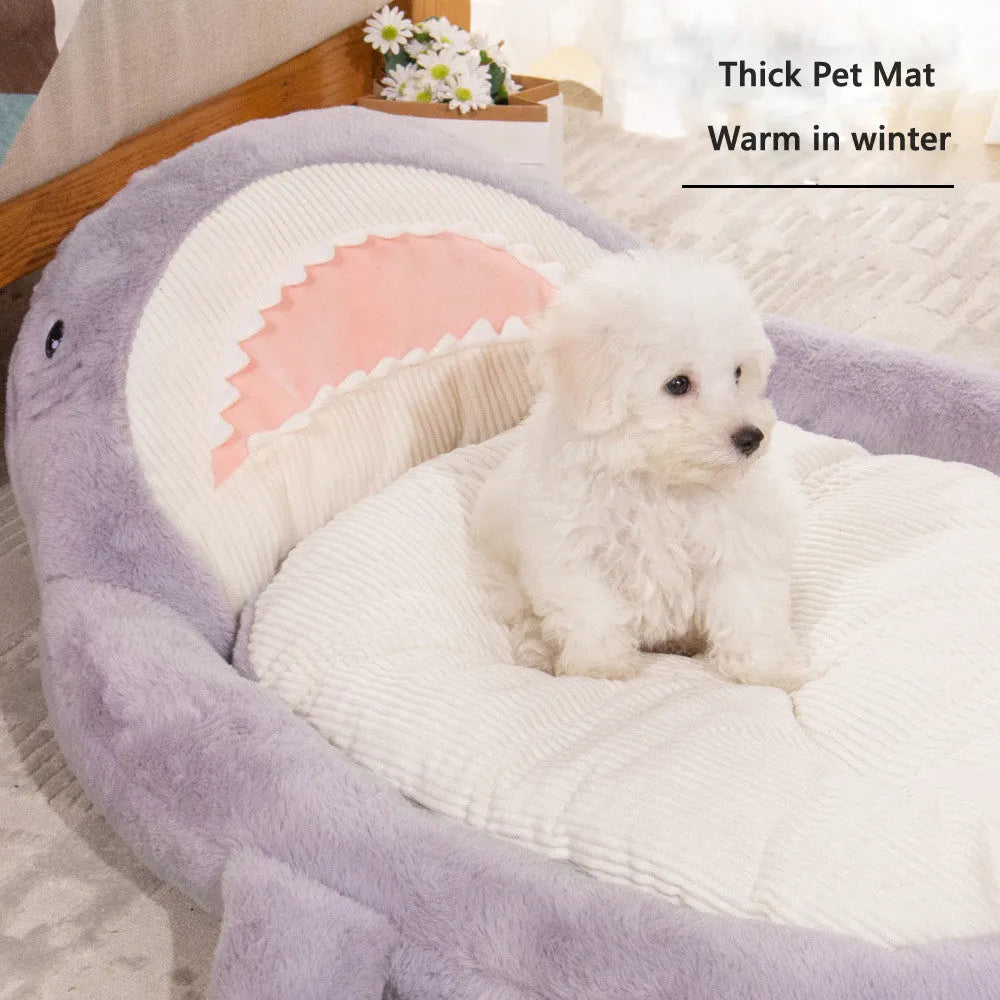 Blue shark pattern pet bed cushion for dogs and cats on a wooden floor