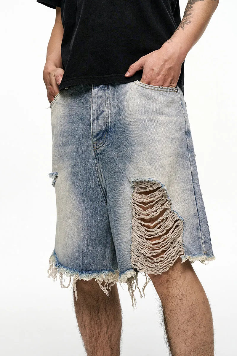 Men's light blue baggy denim shorts with retro washed finish and wide leg design