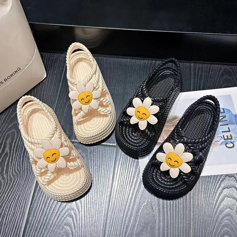Beige PVC sandals with sunflower decoration and non-slip sole shown in size 36-37