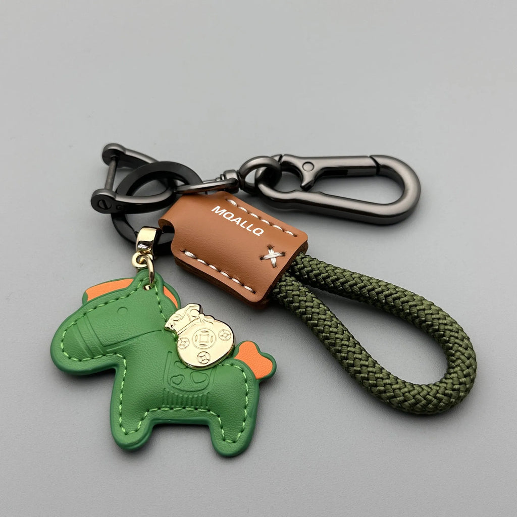 Handmade cowhide key ring pendant with a detailed zinc alloy pony buckle and coloured flannelette rope.